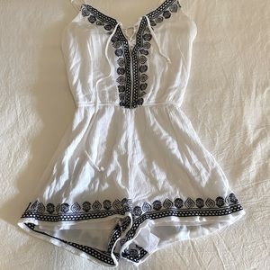 White and blue lace up spaghetti strap romper